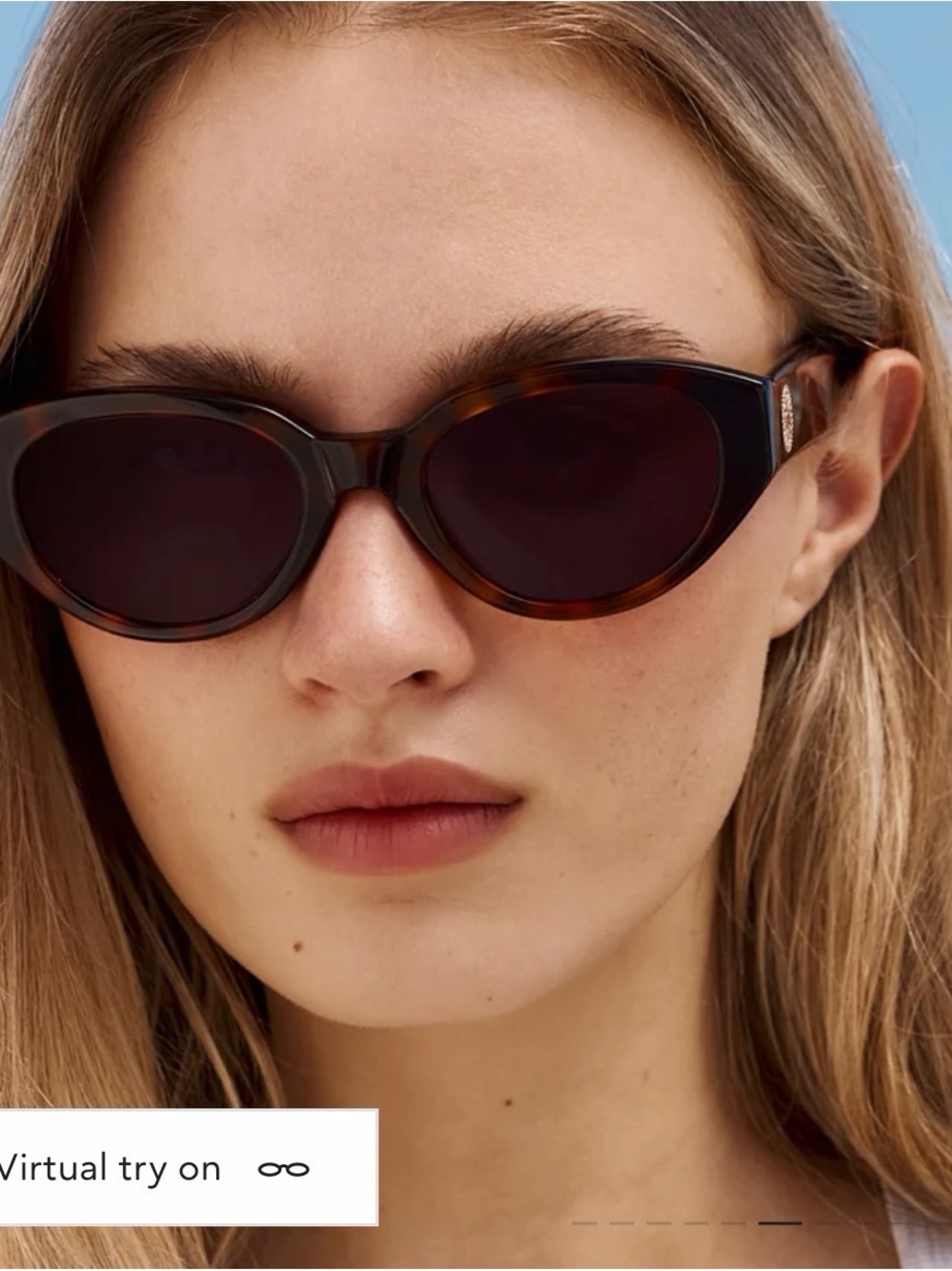 Tortoiseshell Oval Sunglasses with Dark Lenses